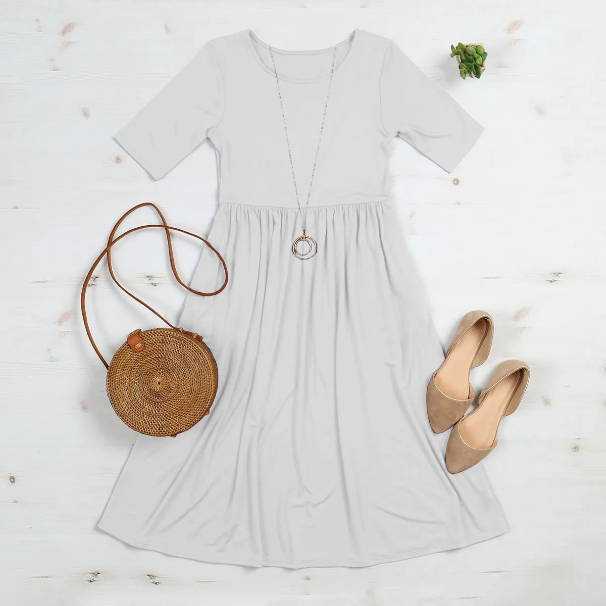 Short Sleeved Empire Waist Pocket Dress